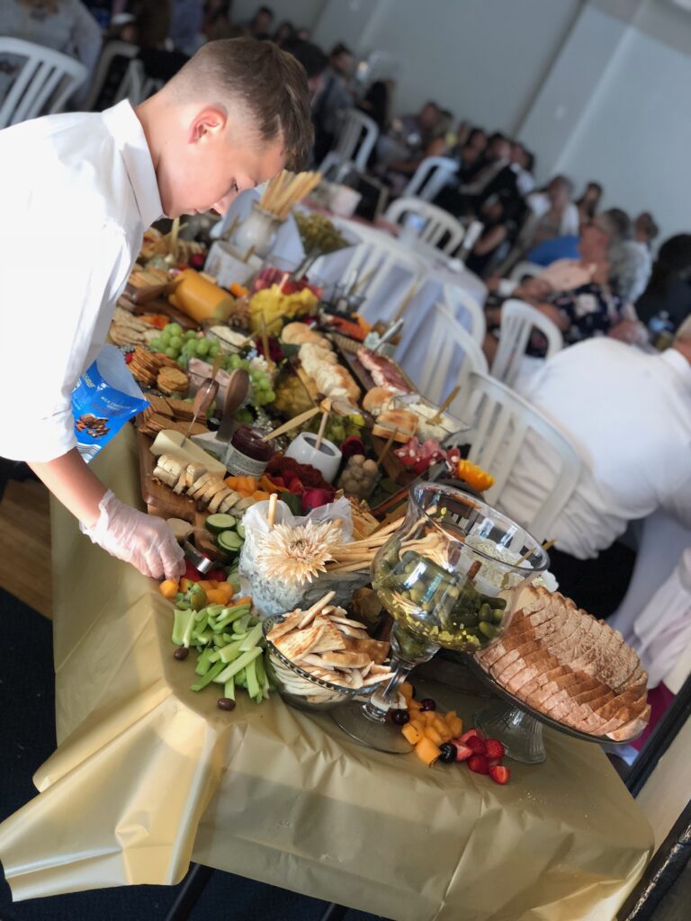 A large table with a lot of food on it.