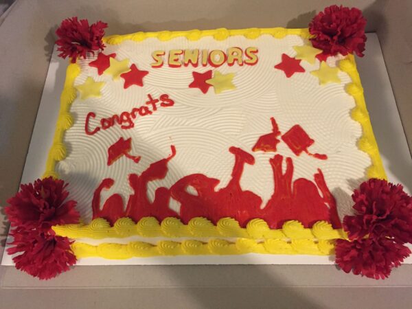 A cake with the words seniors on it.