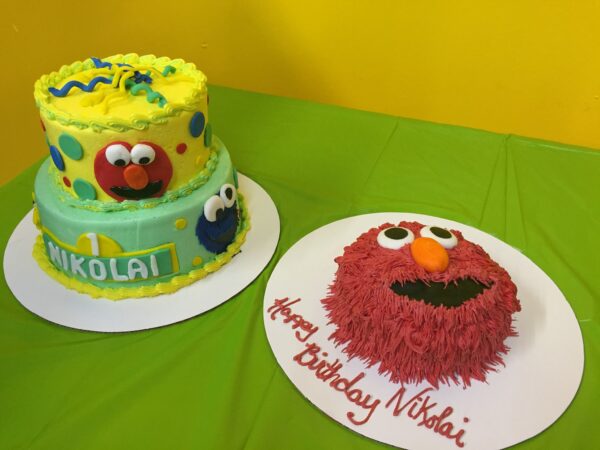 Elmo birthday cake and elmo cake.