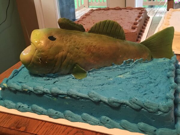 A cake with a fish on it.