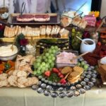 A table full of appetizers and crackers on a table.