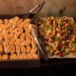 A tray of appetizers on a table.