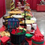 A christmas buffet table with a lot of food on it.