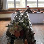 A long table with a lot of food on it.