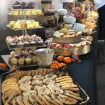 A buffet of cookies and pastries on a table.