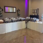 A buffet table set up in a large room.