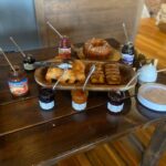 A table with a variety of food on it.