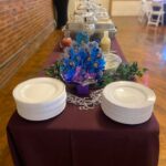 A table set up with plates and silverware.