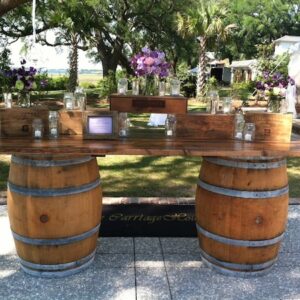 Whiskey Barrels with wood slab top – bar