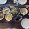 A table full of Wedding Tastings and bowls of food.