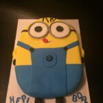 A cake with a minion on it.