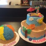 A cake with a beach ball and a cake with a beach ball.