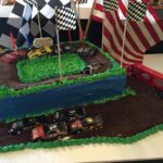 A cake with a race track on it.