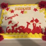 A cake with the words seniors on it.