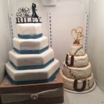 Two wedding cakes in a refrigerator.