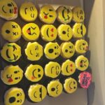 Emoji cupcakes in a box.