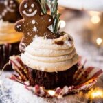 Gingerbread cupcakes with rosemary sprigs.