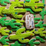 A display of cactus cookies.