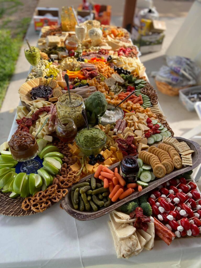 A long table with a lot of food on it.