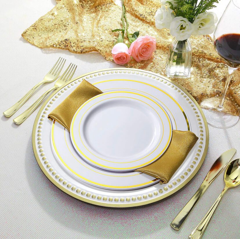 A gold plate with a napkin.